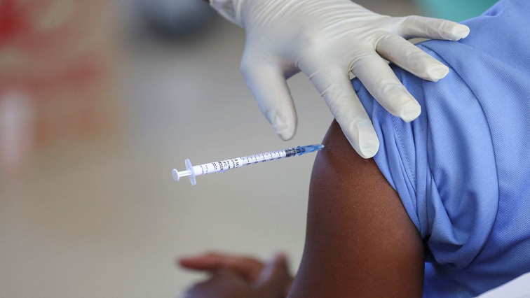 A healthcare worker receives the Johnson and Johnson coronavirus disease (COVID-19) vaccination at the Chris Hani Baragwanath Academic Hospital in Soweto, South Africa, February 17, 2021.