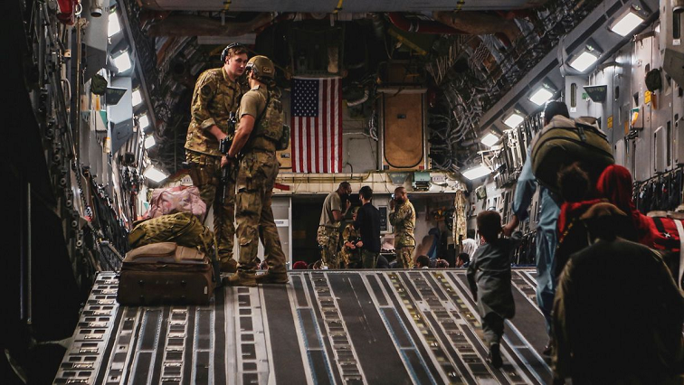 US troops evacuate as many people as possible before an August 31 deadline.