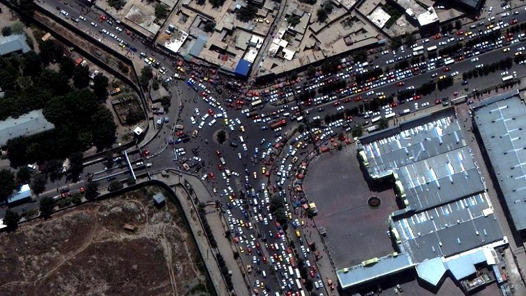 An overview of crowds and traffic at an entrance to Kabul's airport, Afghanistan August 23, 2021. SATELLITE IMAGE 2021 MAXAR TECHNOLOGIES/Handout via REUTERS