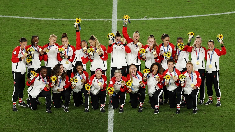 Gold medallists Canada pose during the medal ceremony.