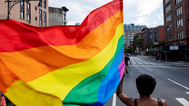 Demonstrators march in support of LGBTQ and Black Lives Matter movements in New York City, New York, June 25, 2020.
