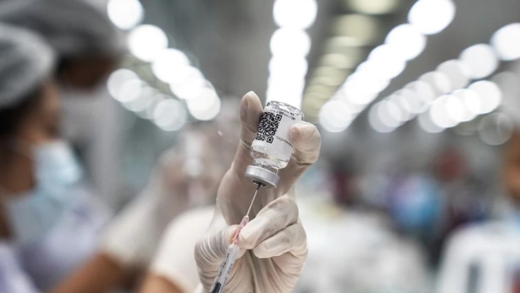 A health worker prepares a dose of AstraZeneca COVID-19 vaccine against the coronavirus disease (COVID-19) at the Central Vaccination Center, inside the Bang Sue Grand Station, Thailand, June 21, 2021.