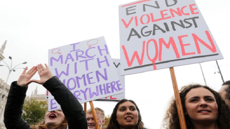Women march against gender-based violence.