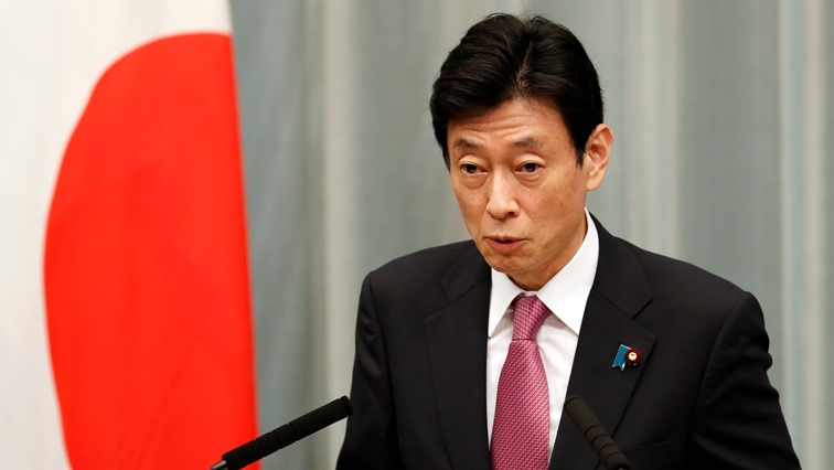 FILE PHOTO: Japan's Minister in charge of economic revitalisation and measures for the novel coronavirus pandemic Yasutoshi Nishimura attends a news conference in Tokyo, Japan, September 16, 2020. REUTERS/Kim Kyung-Hoon