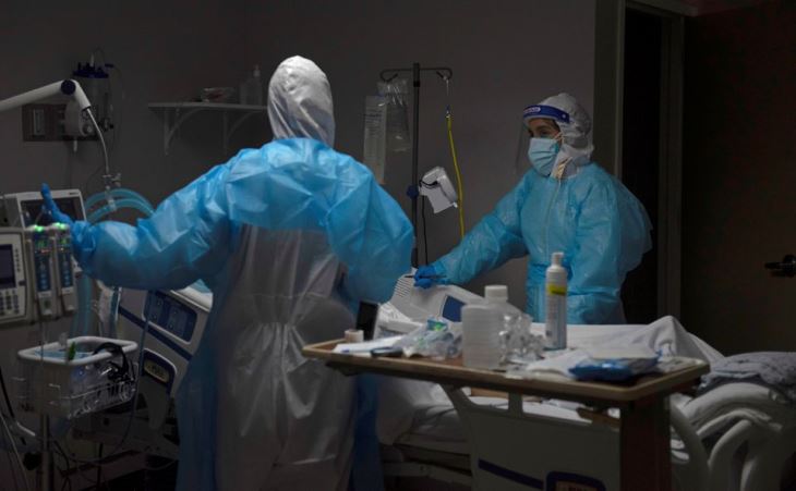 Healthcare personnel work inside a coronavirus disease (COVID-19) unit at United Memorial Medical Center as the United States