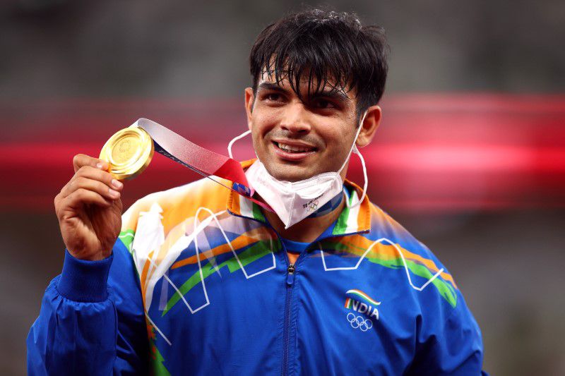 Gold medallist Neeraj Chopra of India reacts on the podium