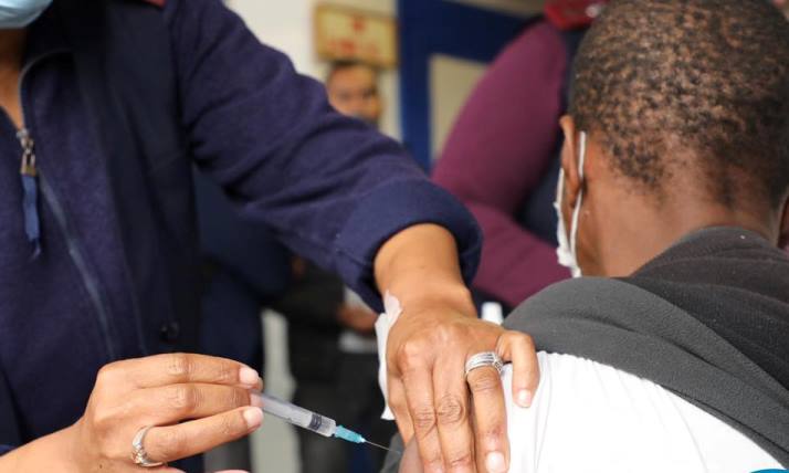 Healthcare worker administers the COVID-19 vaccine to a resident in the Western Cape.