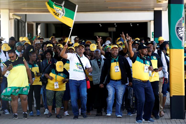Delegates chant slogans as they arrive for the 54th National Conference of the ruling African National Congress (ANC) at the Nasrec Expo Centre in Johannesburg, South Africa December 16, 2017.