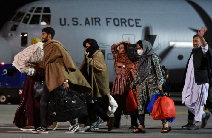 People who have been evacuated from Afghanistan arrive at Pristina International Airport in Pristina, Kosovo August 29, 2021