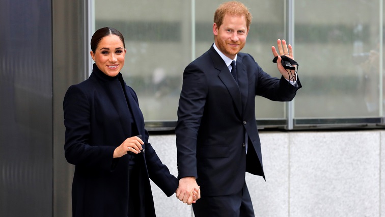 Britain's Prince Harry and Meghan, Duke and Duchess of Sussex, wave while visiting the 9/11 Memorial in Manhattan, New York City, US, September 23, 2021.