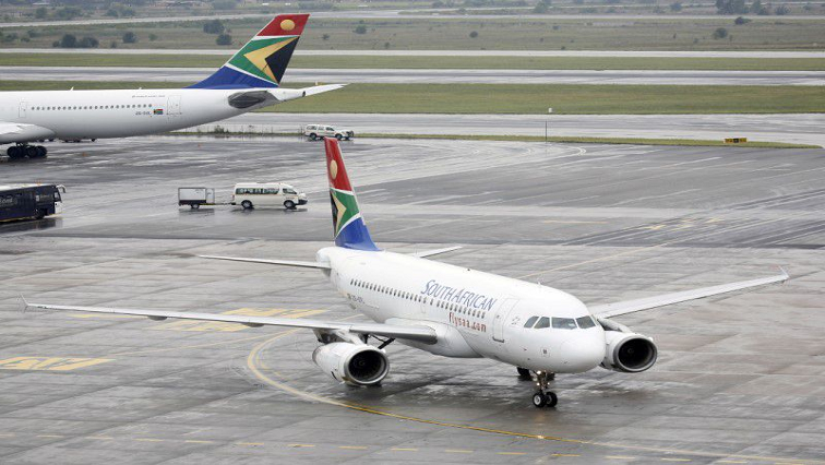 A South African Airways (SAA) plane is towed at OR Tambo International Airport in Johannesburg, South Africa.