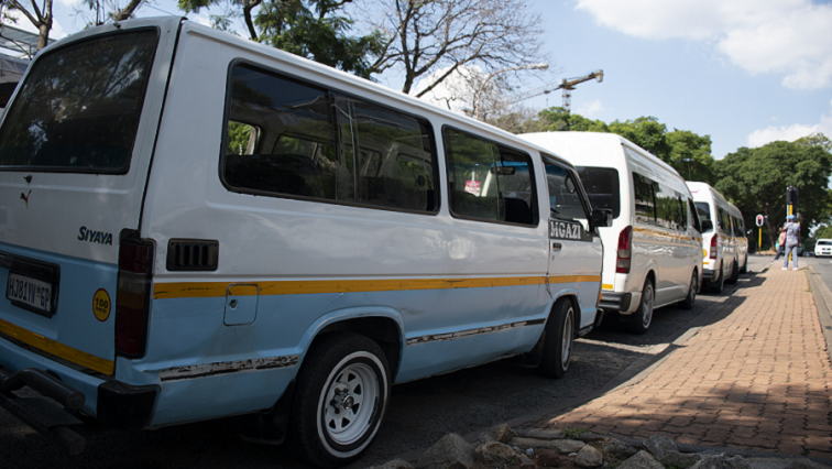 Taxis wait for passengers at a taxi rank in Johannesburg.