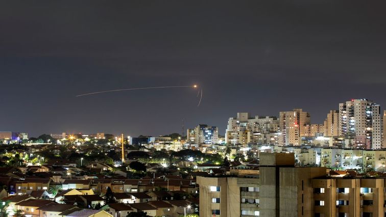 Streaks of light are seen as Israel's Iron Dome anti-missile system intercepts a rocket launched from the Gaza Strip towards Israel, as seen from Ashkelon, Israel September 11, 2021.