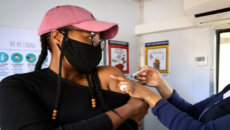A woman receives the Johnson and Johnson coronavirus disease (COVID-19) vaccination in Houghton, Johannesburg, South Africa, August 20, 2021.