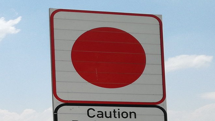 Caution road sign is seen in the image above.