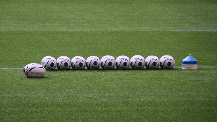 File Image: Rugby balls on a field.