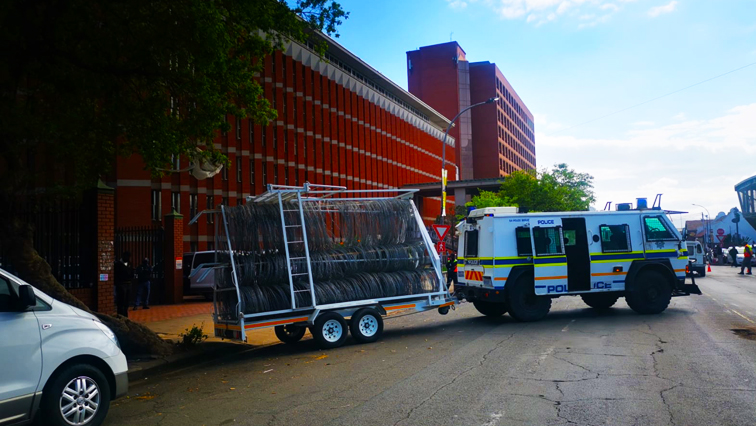 Police outside the Pietermaritzburg High Court ahead of the arms deal corruption trial of former President Jacob Zuma and French arms dealer Thales, September 21, 2021.
