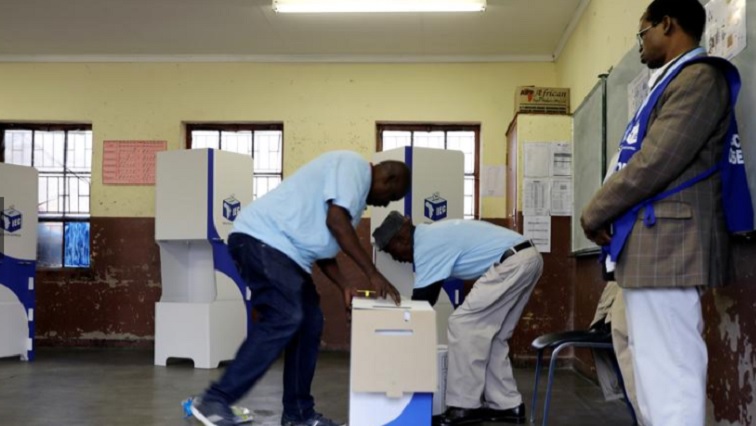 Election officials prepare boxes at a polling station, ahead of the South Africa's parliamentary and provincial elections in Seshego, South Africa May 8, 2019.