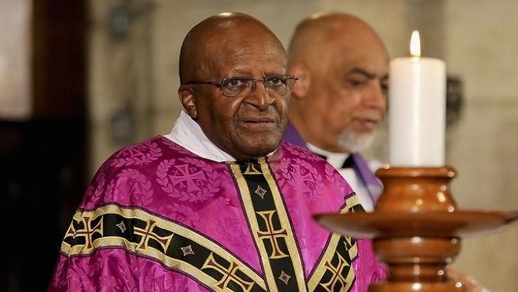 Former Archbishop of Cape Town and veteran anti-apartheid campaigner Desmond Tutu holds a mass at Cape Town's Anglican St George's Cathedral December 6, 2013.