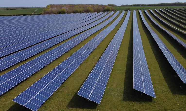 A field of solar panels is seen near Royston, Britain, April 26, 2021. Picture taken with a drone.