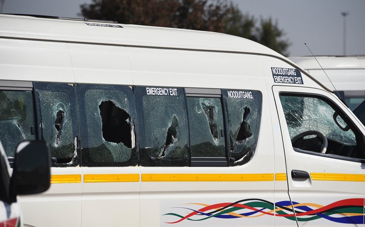 File Photo : A taxi damaged in violence between rival taxi associations Witwatersrand African Taxi Association (WATA) and Nancefield Dube West Taxi Association (Nanduwe) in Soweto.