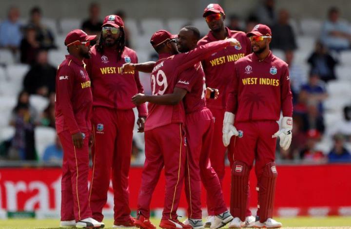 File Photo: West Indies' Kemar Roach celebrates the wicket of Afghanistan's Gulbadin Naib with teammates.