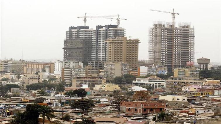 Office buildings are seen under construction in the capital of Luanda, August 30, 2012.