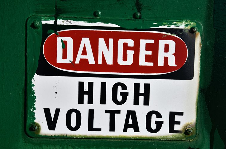 A sign board showing a high voltage transformer