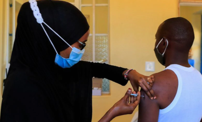 A nurse administers the coronavirus disease (COVID-19) vaccine to a man at the Bissil Health Centre within Iibissil settlement, Matapato North of Kajiado county, Kenya August 23, 2021.