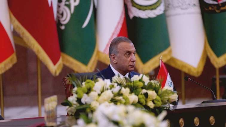 FILE PHOTO: Iraqi Prime Minister Mustafa al-Kadhimi attends the Baghdad summit in Baghdad, Iraq, August 28, 2021. Iraqi Prime Minister Media Office/Handout via REUTERS/File Photo