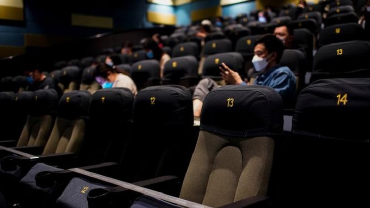 People wearing face masks are seen in a cinema as it reopens following the coronavirus disease (COVID-19) outbreak, in Shanghai, China July 20, 2020.
