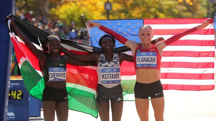 2018 Second placed Vivian Cheruiyot of Kenya, first placed Mary Keitany of Kenya and third placed Shalane Flanagan of the U.S. celebrate after the Professional Women's race.