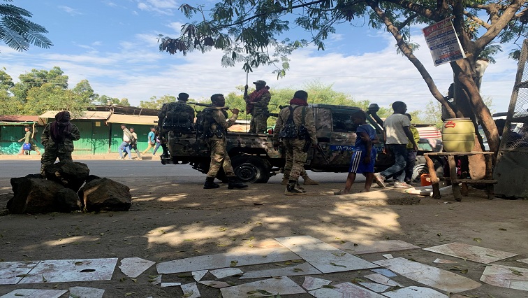 FILE PHOTO: Members of Ethiopian National Defence Force prepare to head to mission in Sanja, Amhara region, near a border with Tigray, Ethiopia November 9, 2020.