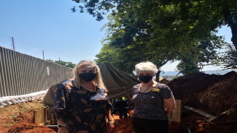 City of Ekurhuleni Executive Mayor Tania Campbell and Bedfordview Ward 20 Cllr Jill Humphreys visit the construction site to offer support to Eskom employees as they continue with repairs to the damaged Bedforview substation cable.