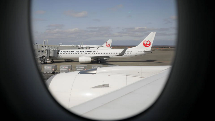 Japan Airlines (JAL) planes sit on the tarmac at New Chitose Airport, in Sapporo, Hokkaido, Japan May 4, 2021.