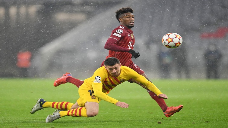 Soccer Football - Champions League - Group E - Bayern Munich v FC Barcelona - Allianz Arena, Munich, Germany - December 8, 2021 Bayern Munich's Kingsley Coman in action with FC Barcelona's Clement Lenglet REUTERS/Andreas Gebert