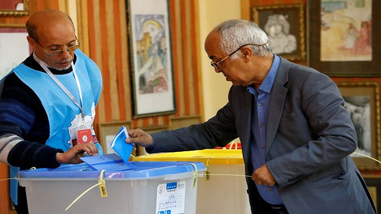 A man casts his vote at a polling station in Zwara, Libya.