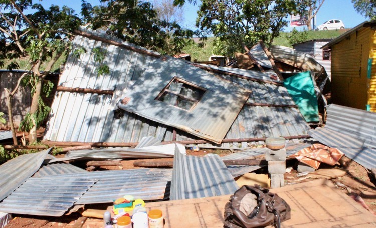 An informal dwelling seen destroyed by a storm