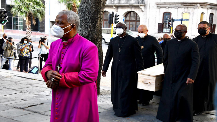 Archbishop Desmond Tutu’s body arrives at St George’s Cathedral in Cape Town.