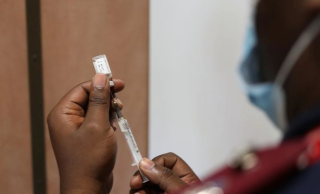 A nurse prepares a dose of the coronavirus disease (COVID-19) vaccine as the new Omicron variant spreads, in Dutywa, in the Eastern Cape province, South Africa