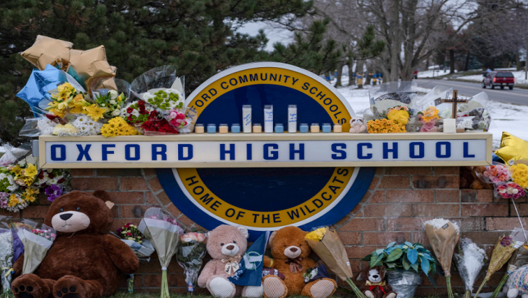A memorial is seen at Oxford High school, a day after a shooting that left four dead and eight injured, in Oxford, Michigan. December 1, 2021.