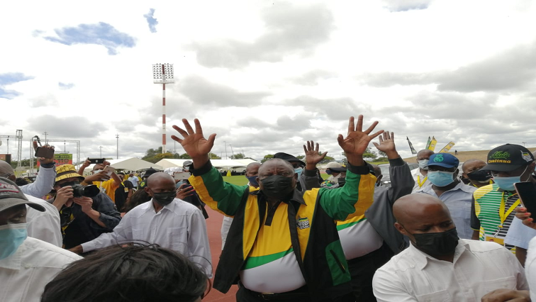 President Cyril Ramaphosa waving to the crowd during 110 ANC celebration.