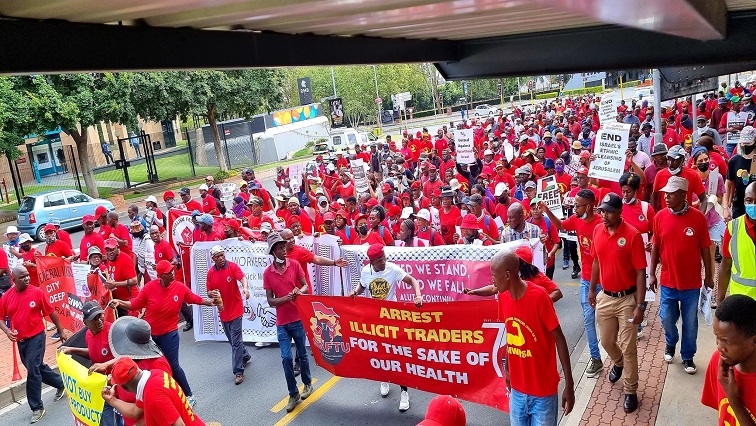Saftu members seen at a protest in Sandton, Johannesburg on 27 January 2022.