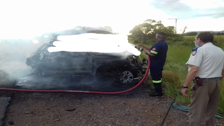 Emergency Services staff seen extinguishing a fire in one of the vehicles involved in the crash on the N1 near Mookgophong in Limpopo.