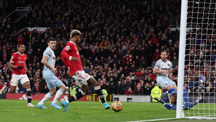 Soccer Football - Premier League - Manchester United v West Ham United - Old Trafford, Manchester, Britain - January 22, 2022 Manchester United's Marcus Rashford scores their first goal.