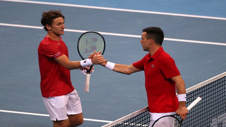 ATP Cup - Sydney Olympic Park, Sydney, Australia - January 3, 2022 Spain's Roberto Bautista Agut shakes hands with Norway's Casper Ruud after winning their group stage match.