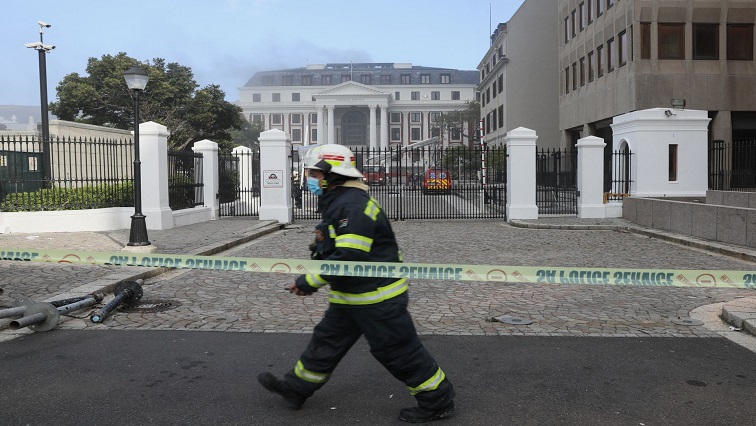 [File Image] Firefighters work after a fire broke out in Parliament in Cape Town, South Africa.