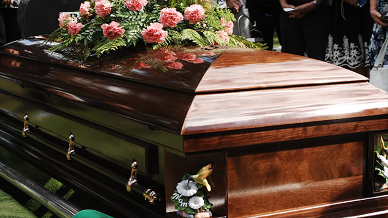File Image: A wooden coffin is seen in the image above.
