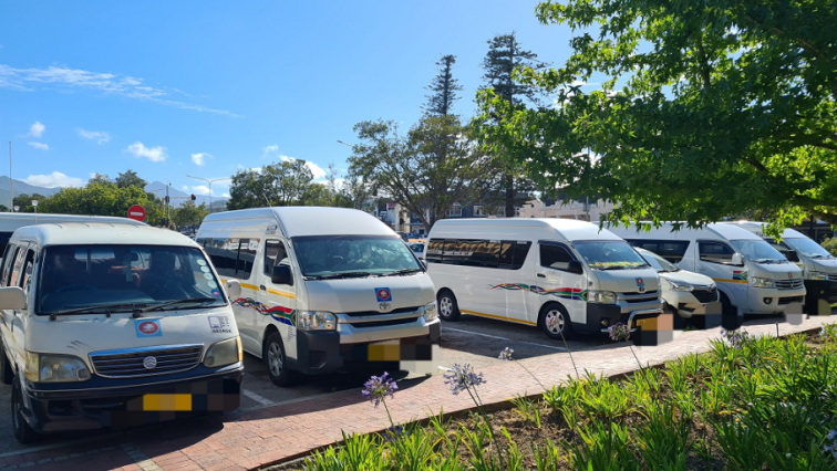 Taxis parked at a taxi rank in George, Western Cape.