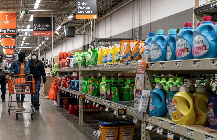 Shoppers browse in a Home Depot building supplies store while wearing masks to help slow the spread of coronavirus disease (COVID-19) in north St. Louis, Missouri, U.S. April 4, 2020.